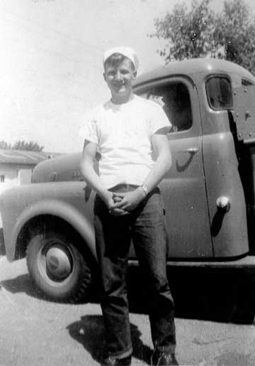 Ralph poses by his truck shortly after joining the United States Coast Guard