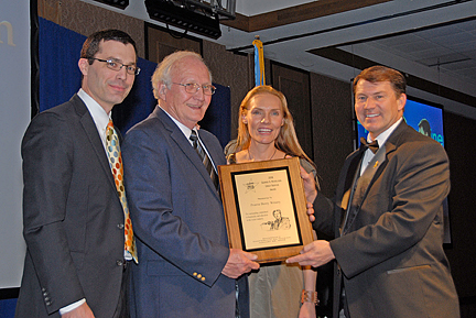 Governor Mike Rounds presents Matt, Ralph, and Sandi with the George S. Mickelson Great Service Award